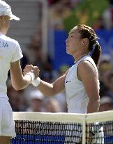 Sugiyama shakes hands with Dokic after straight sets loss